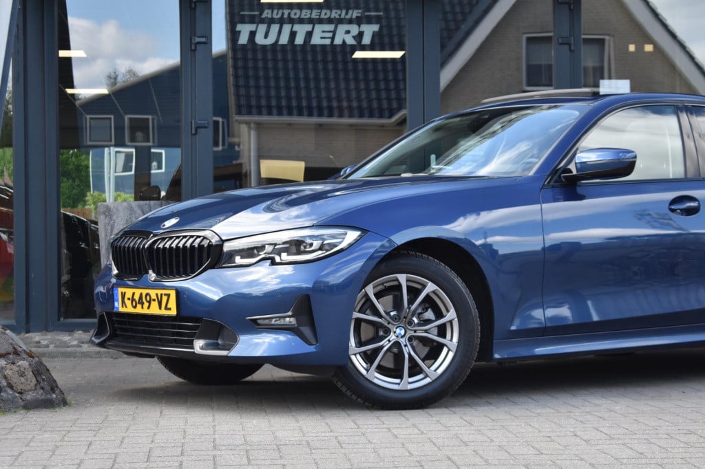 BMW 3-serie 320i high executive | harman kardon | schuif kanteldak | leder 