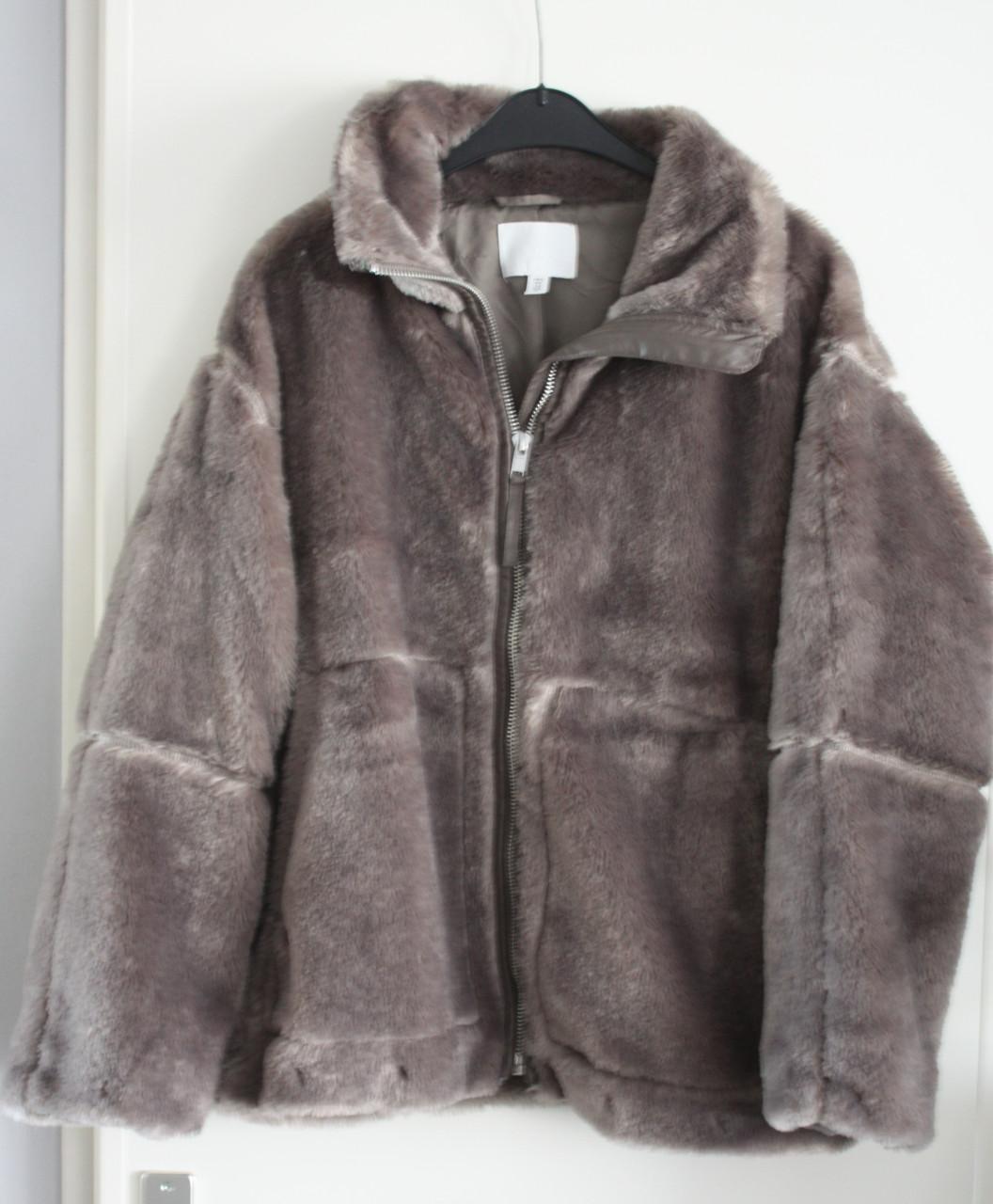 Zachte grijze jas maat m