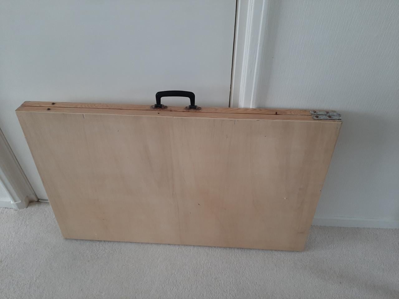 Opklapbare behangtafel.