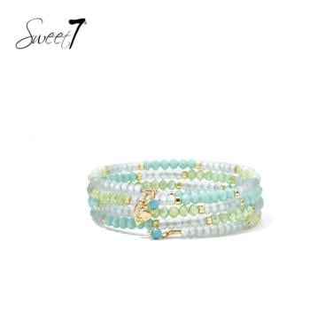 Armband groen met kralen in mint en goudtinten