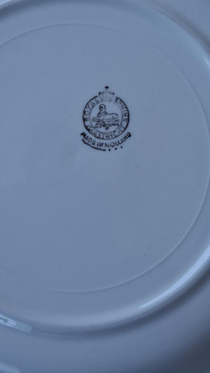 Ontbijtbordjes met afbeelden steden