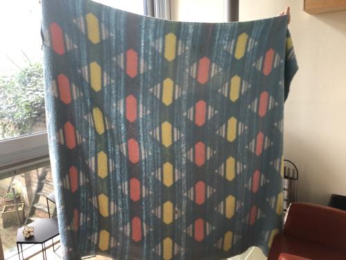 Vintage deken in zachte pastelkleuren
