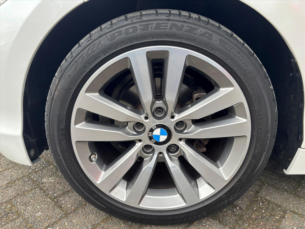 BMW 1 Serie (f20) 118i 136pk aut steptronic sport line | unieke km stand|ri