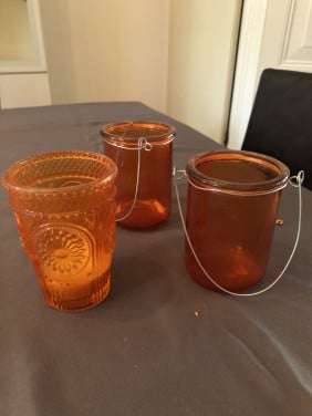 3 oranje waxinelichtjes