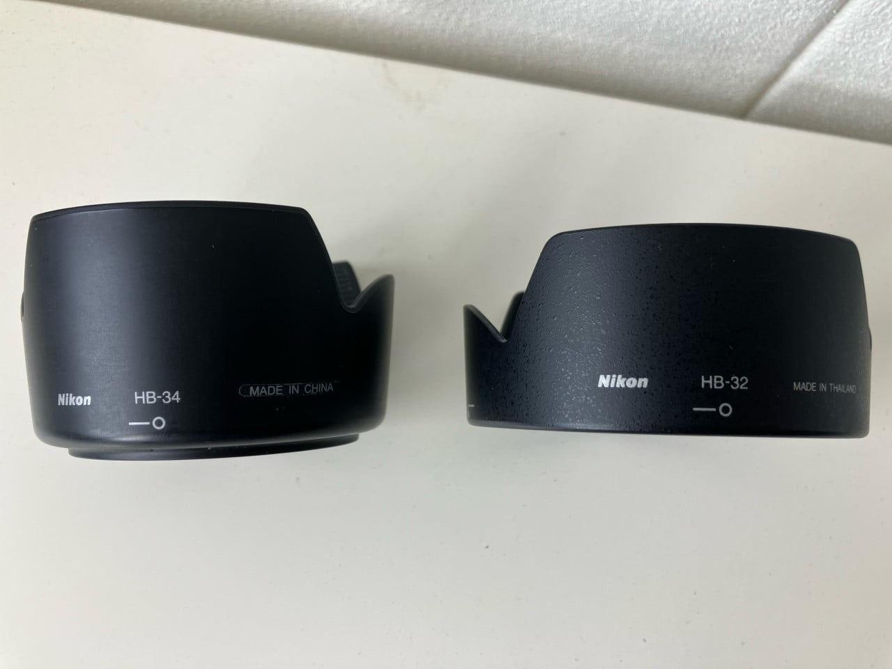 2x zonnekap Nikon