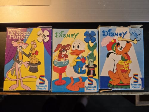 3 mini-puzzels van Schmidt Puzzle met: Roze Panter. Donald Duck. Pluto.