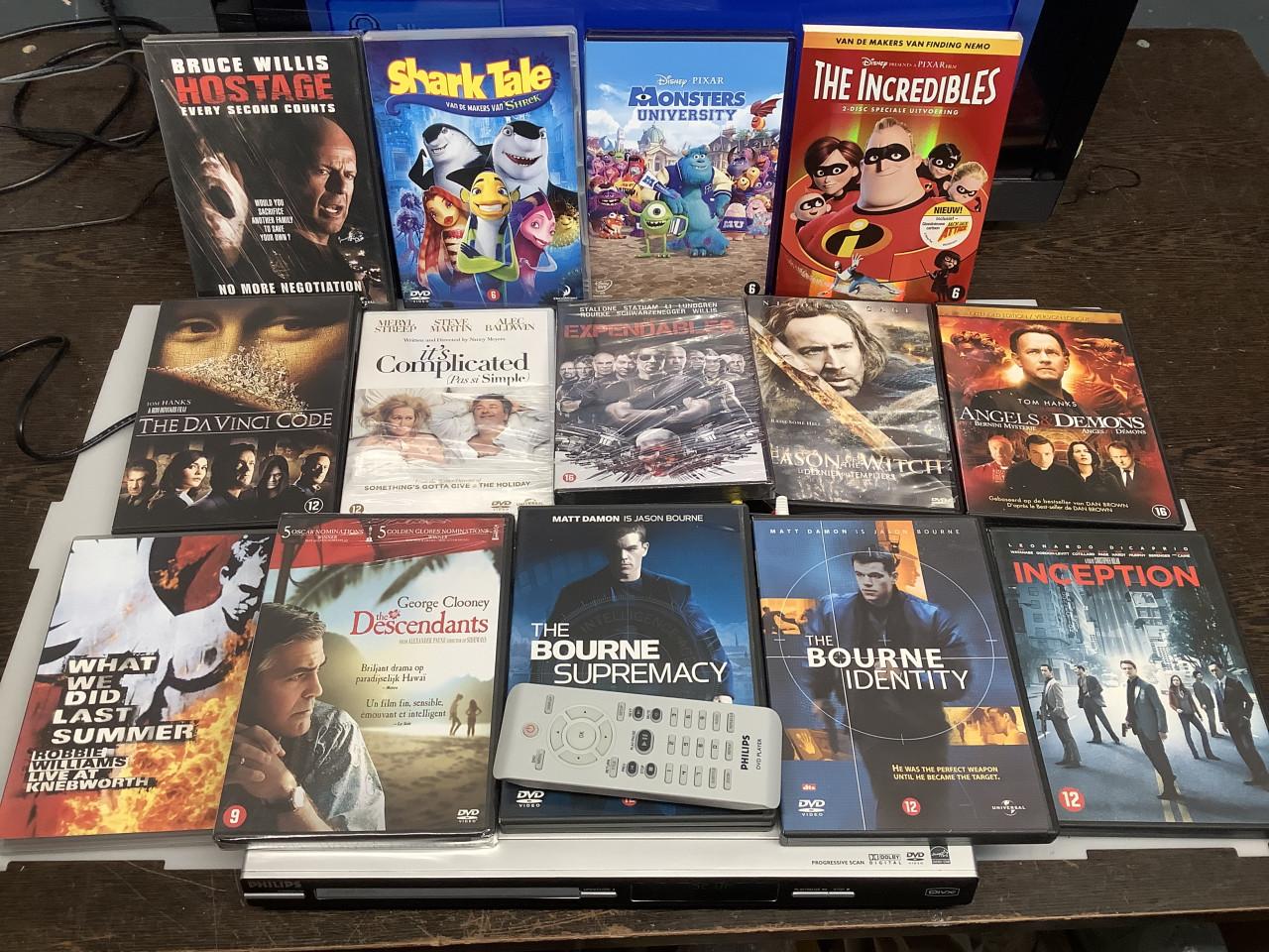 DVD speler van Philips type DVP3142 met afstandsbediening. Met stapel dvd’s