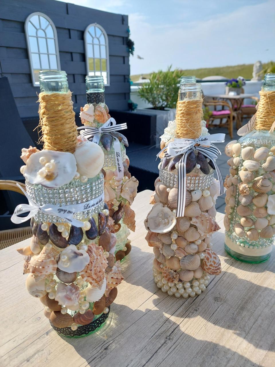 Unieke schelpen flessen decoratie