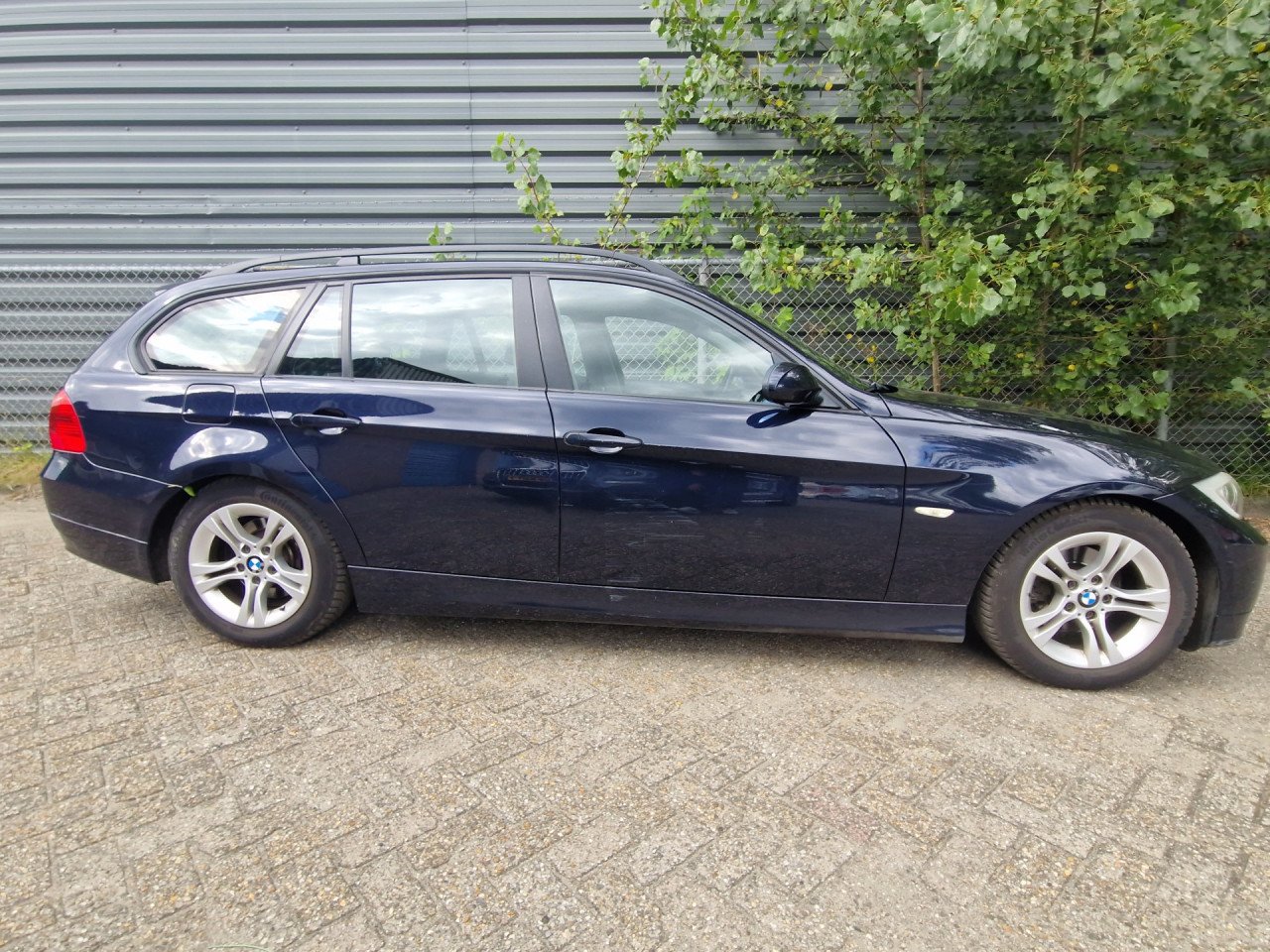 BMW 3-serie Touring 318i High Executive