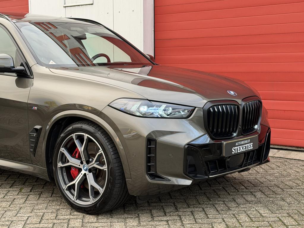 BMW X5 xdrive50e m-sport | pano | luchtvering | elek. trekhaak | rijklaar i