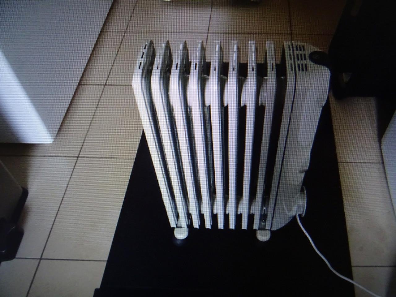 Te koop elektrische verwarming radiator twee standen bijna nieuw