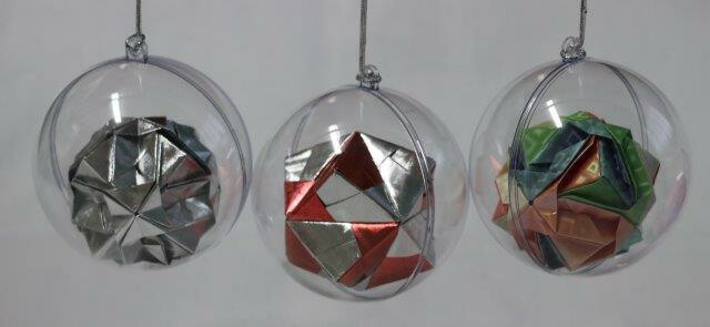 Origami kerstbal Hangertje €.2,50 Grootte: 8 cm doorsnee Doorzichtige
