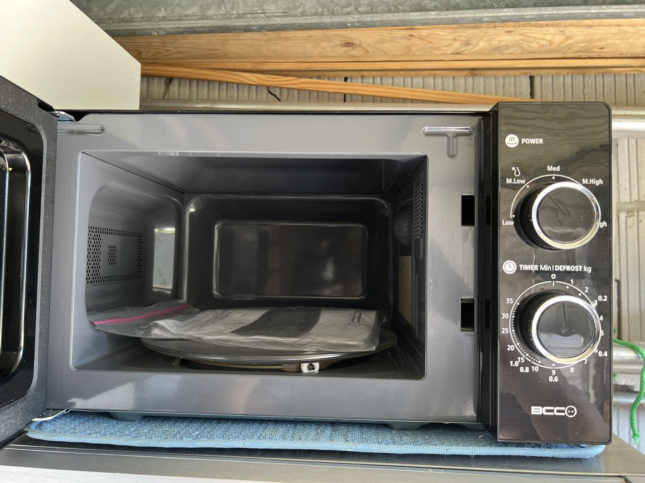 Nieuwe Magnetron zwart met handleiding nieuwprijs €79,-