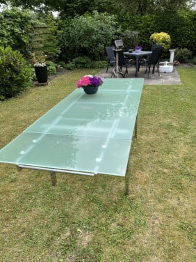 Te koop glazen eetkamertafel
