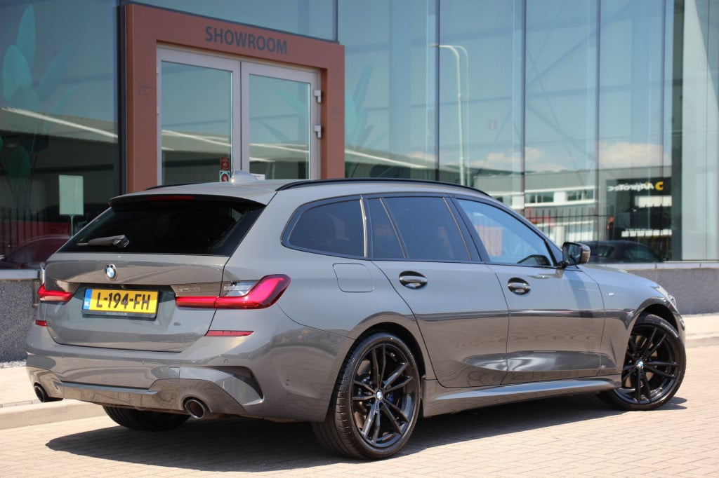 BMW 3-serie touring 320i high executive m pakket | pano | laser | leder