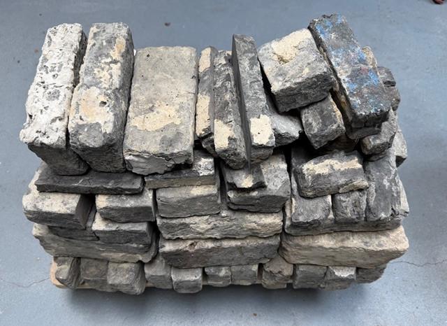 Antieke grijze paepsteentjes