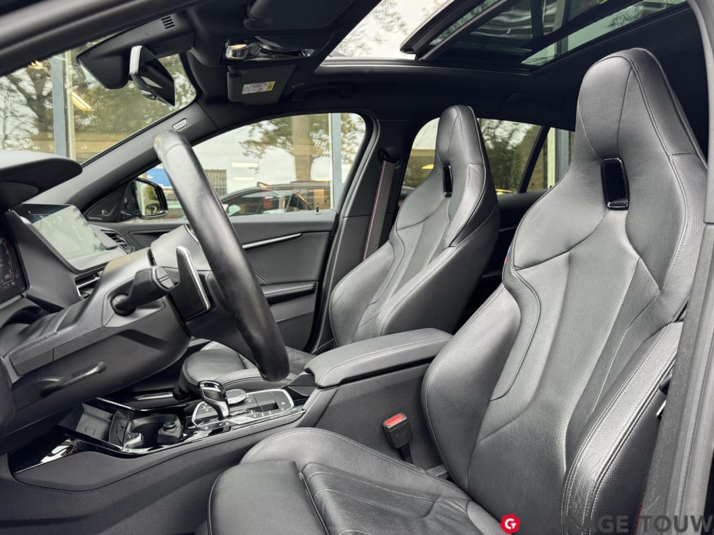 BMW 1 Serie m135i xdrive high executive edition pano orig.nl