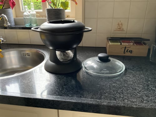 Gietijzeren fonduestel