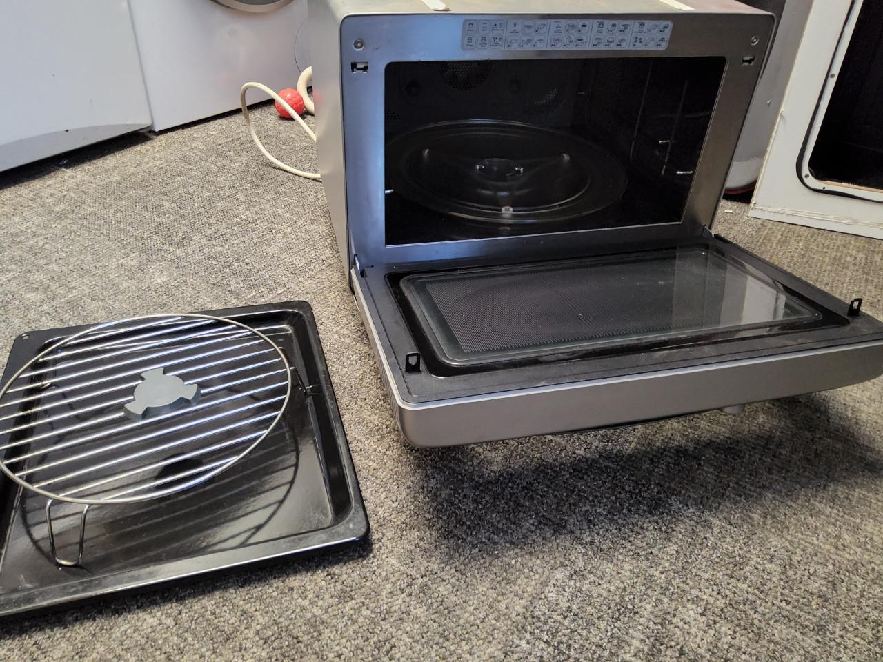 Whirlpool JT 368 SL vrijstaande combi-magnetron zilver
