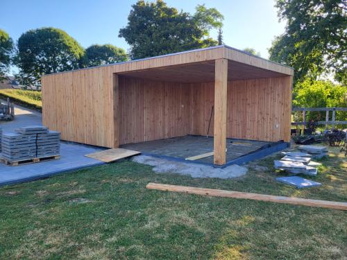 Tuinkamers overkappingen tuinhuizen en meer