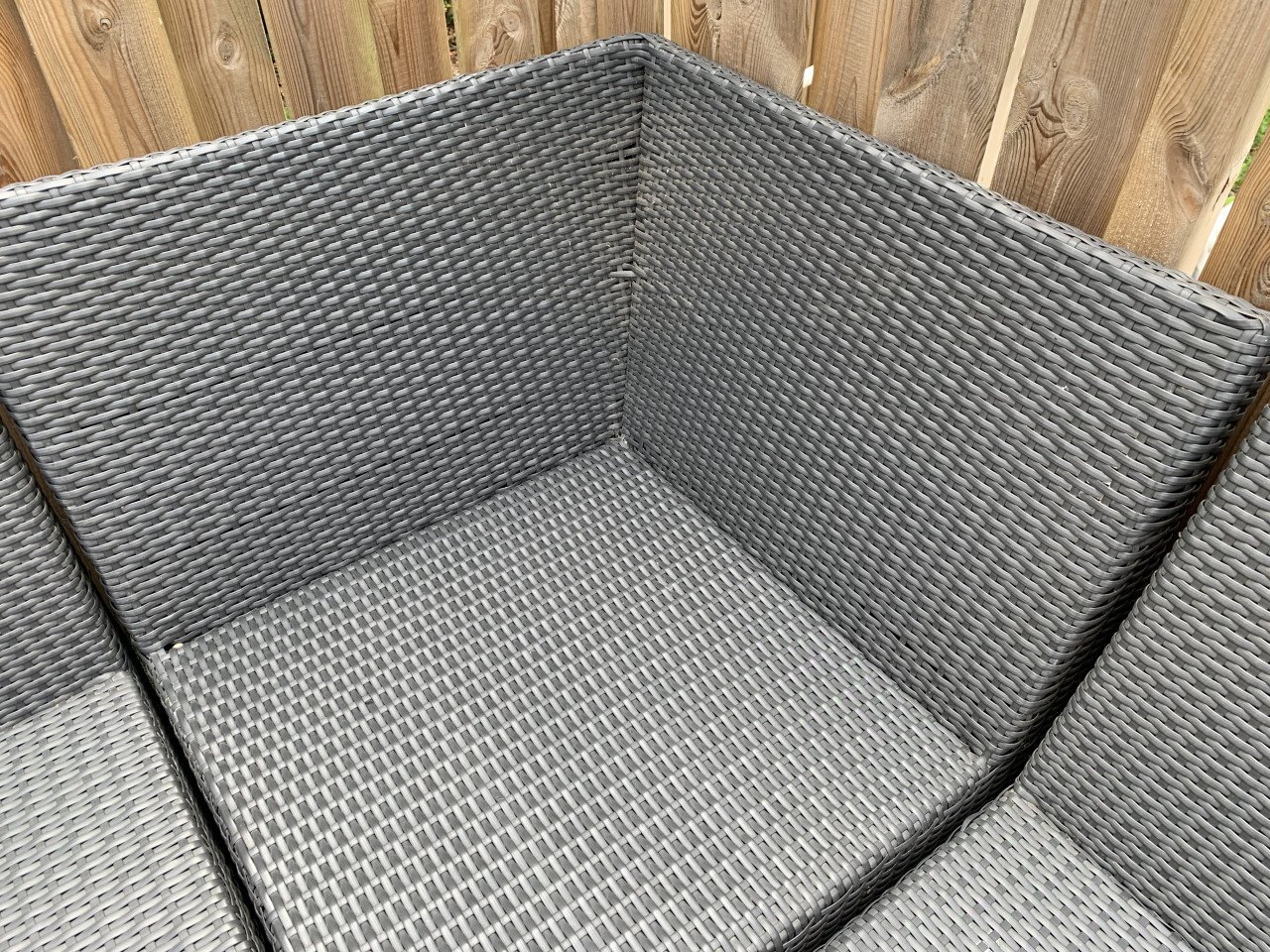 Loungeset zwart wicker, plus tafel plus kussens
