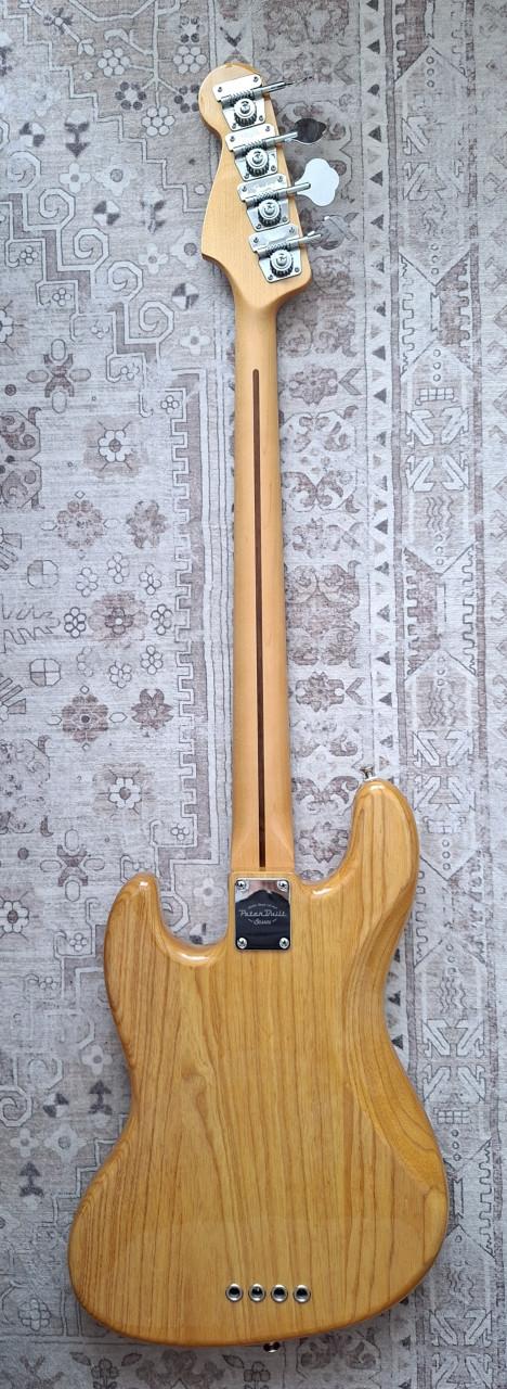 Fender Peterbuilt Jazz basgitaar naturel z.g.a.n.