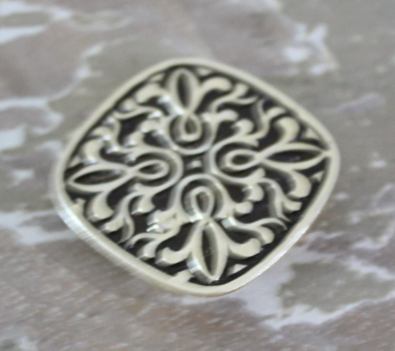 Goudkleurige  sjaalclip met werkje