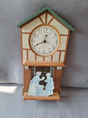 Houten wandklok