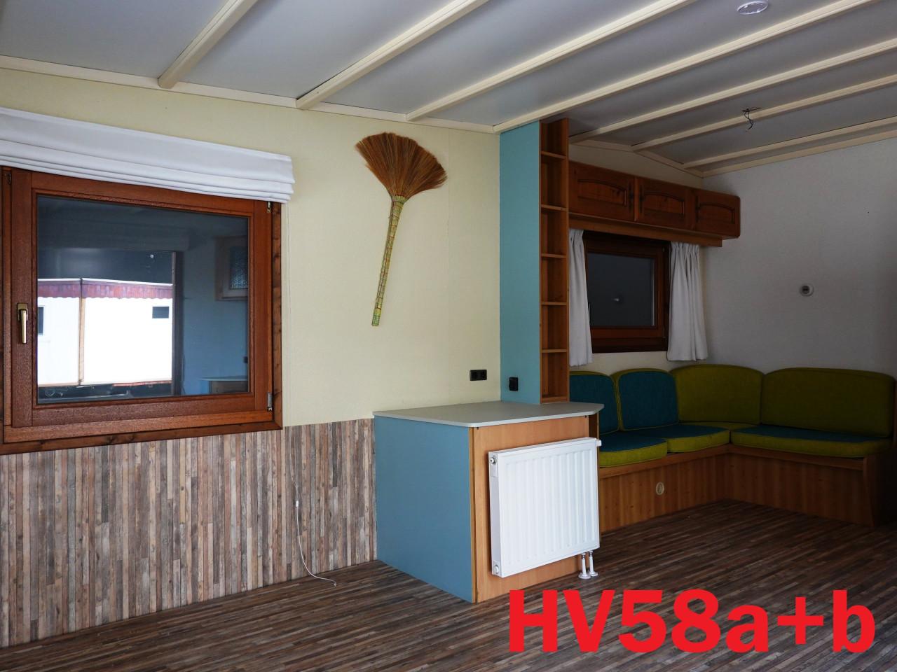 Edelweisz L-chalet met hardhouten kozijnen met dubbel glas en CV te koop