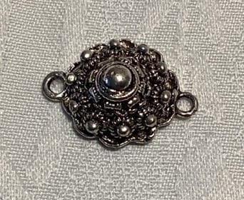 Sieraden    Zeeuwse knop   A 75 tussen schakel 2 cm