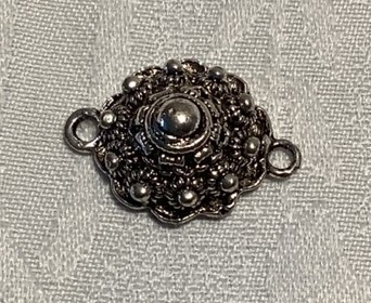 Sieraden    Zeeuwse knop   A 75 tussen schakel 2 cm