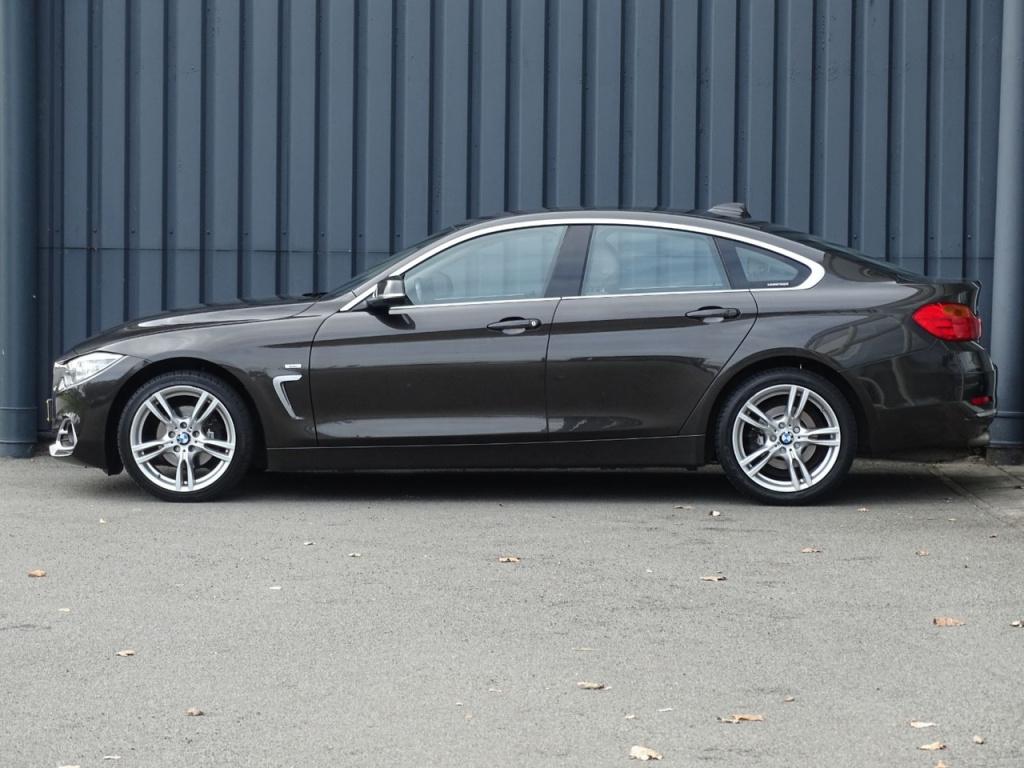 BMW 4 Serie gran coupé 420i xdrive high executive | leder | pano | memory