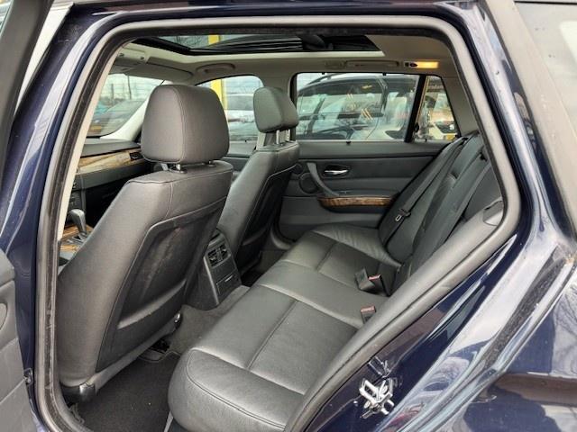 BMW 3-serie touring 318i | pano | trekhaak | xenon | garantie