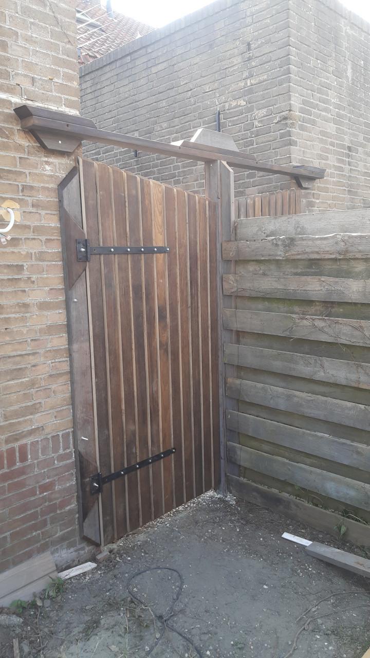 Vloerenleggen- schilder of timmerwerk