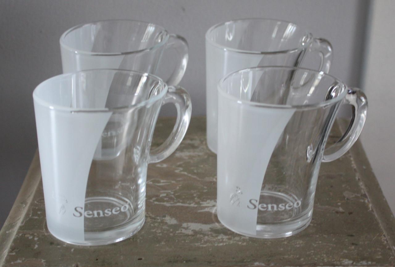 Set van 4 Douwe egberts senseo kopjes.