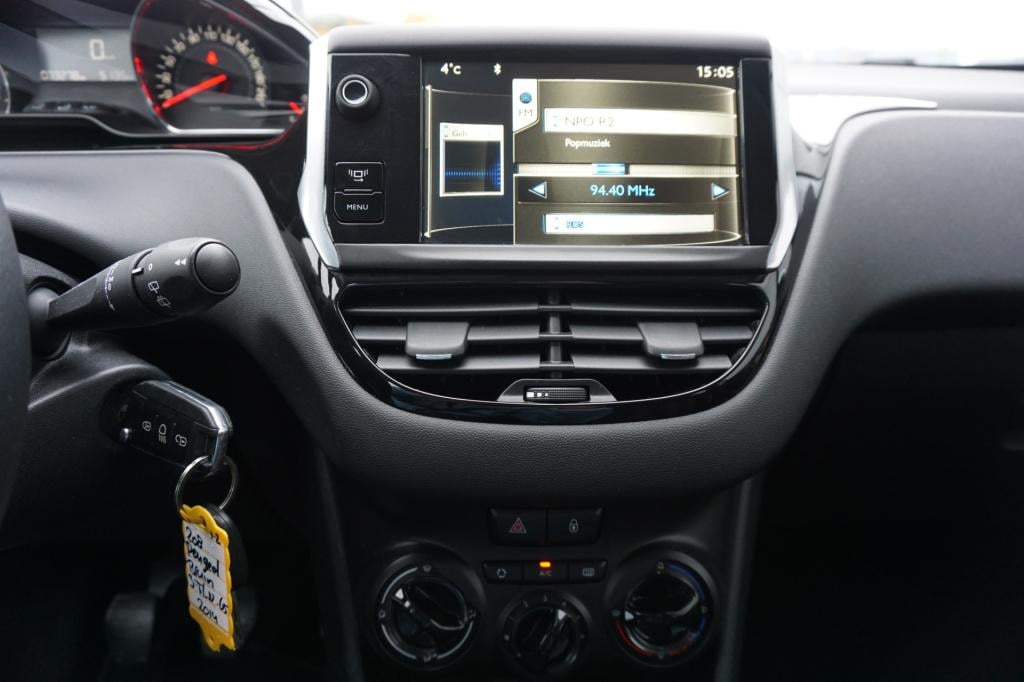 Peugeot 208 1.2 vti allure airco / cruise / elektr. ramen / parkeers. / nap