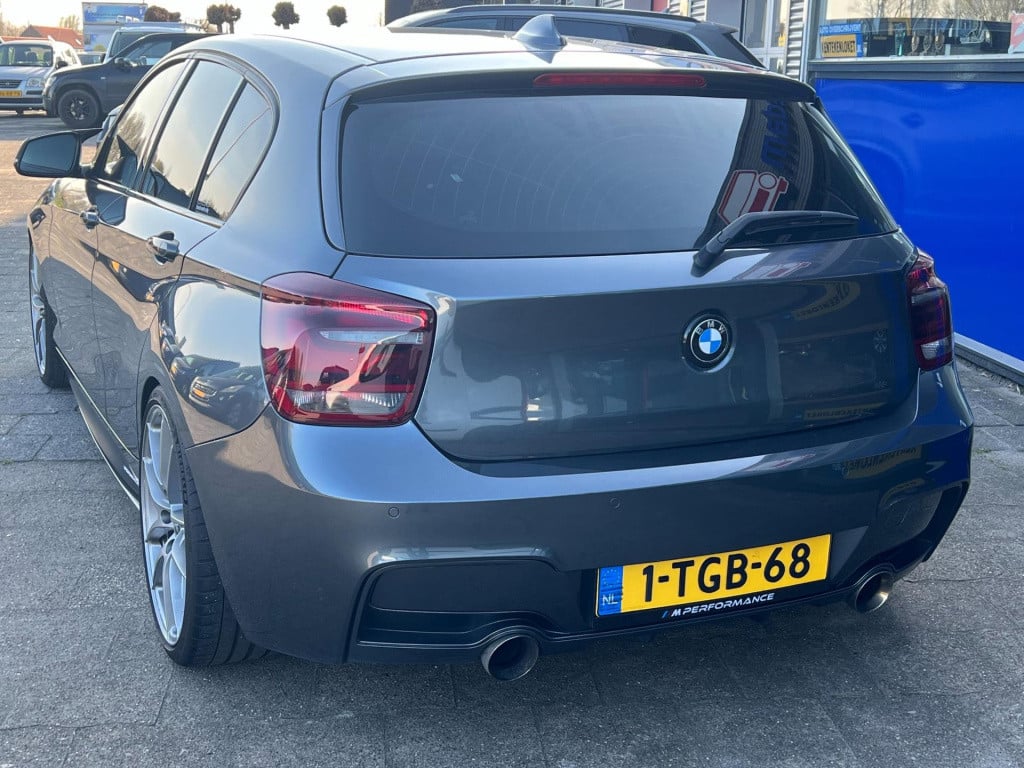 BMW 1 Serie m135i xdrive high executive, customized, stage 2 437 pk!