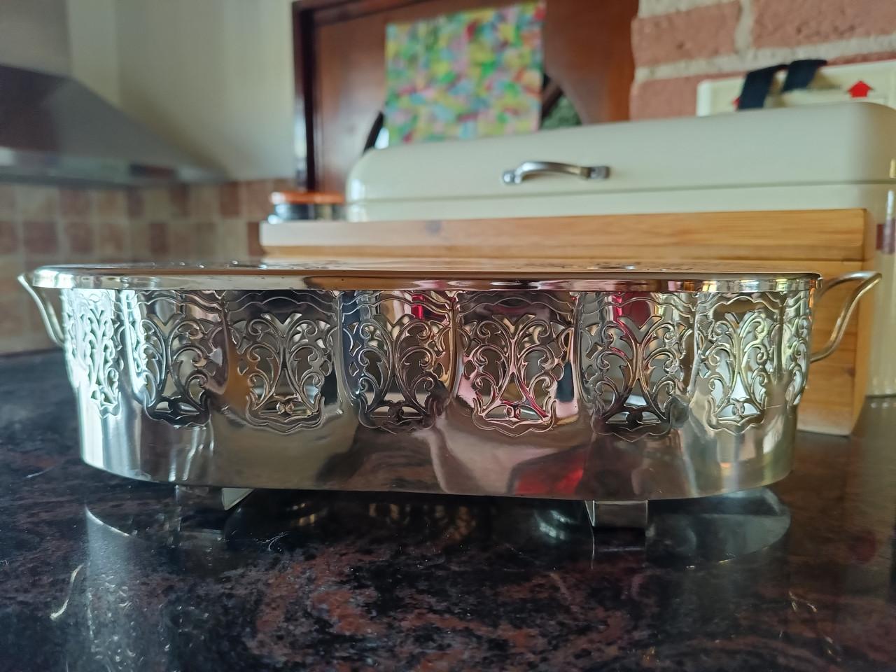 Vintage verzilverde warm houd plaat