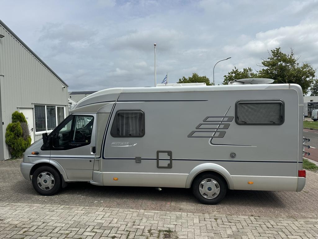 Hymer Onbekend hv 562 compacte hymer van | half-integraal met lengtebedden 