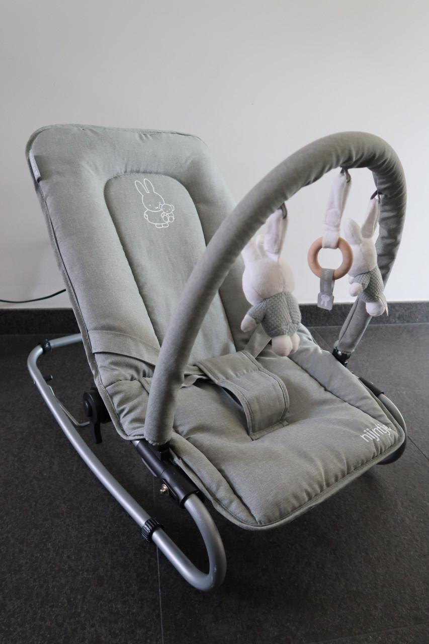 Prénatal olijfgroen Nijntje wipstoel ( van 0 tot 9 mnd./9 kg) z.g.a.n.