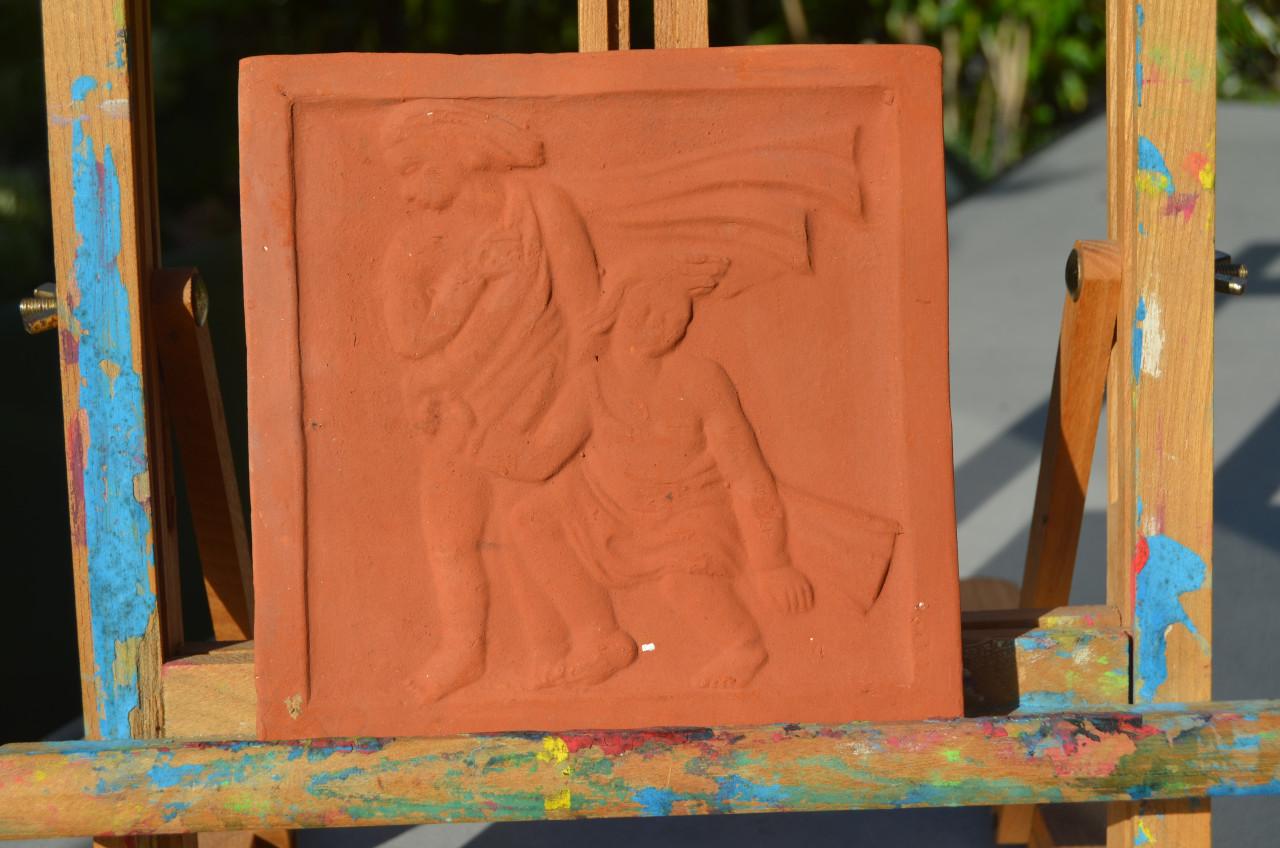 Verschillende terracotta tegels Sterrenbeelden/ Zodiac