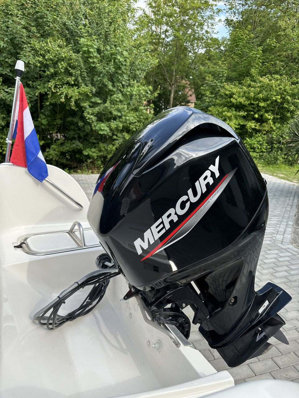 Mooie Elan 15SC met vrijwel nieuwe Mercury 60 pk en Pega trailer