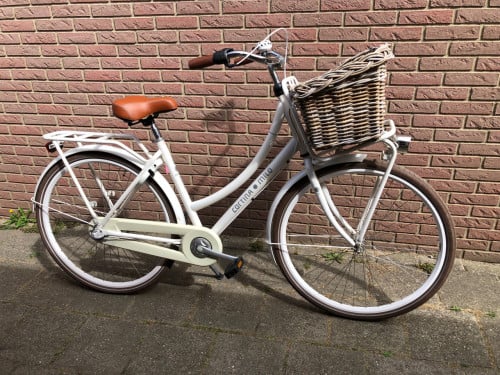 Damesfiets / cortina.