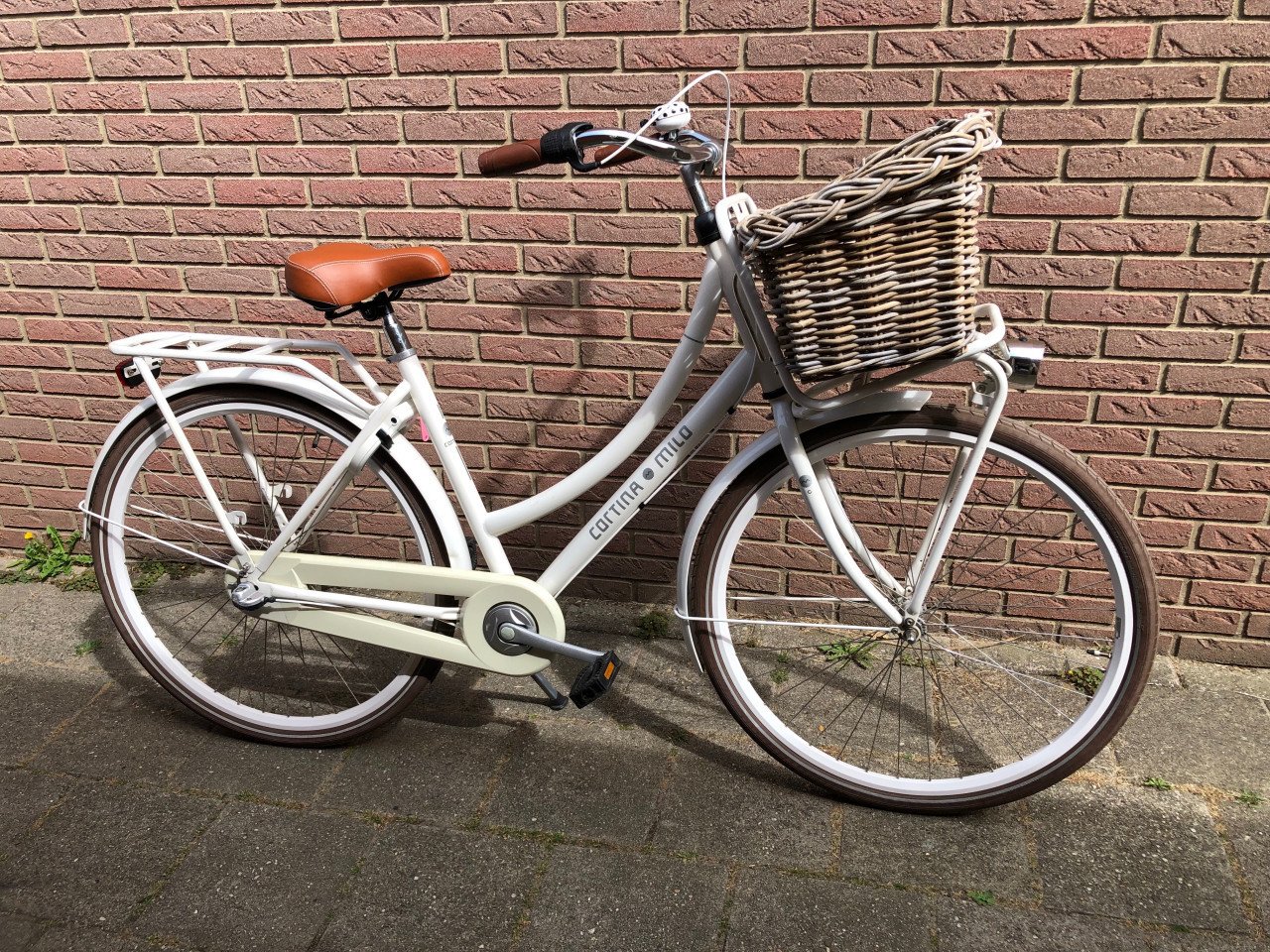 Damesfiets / cortina.