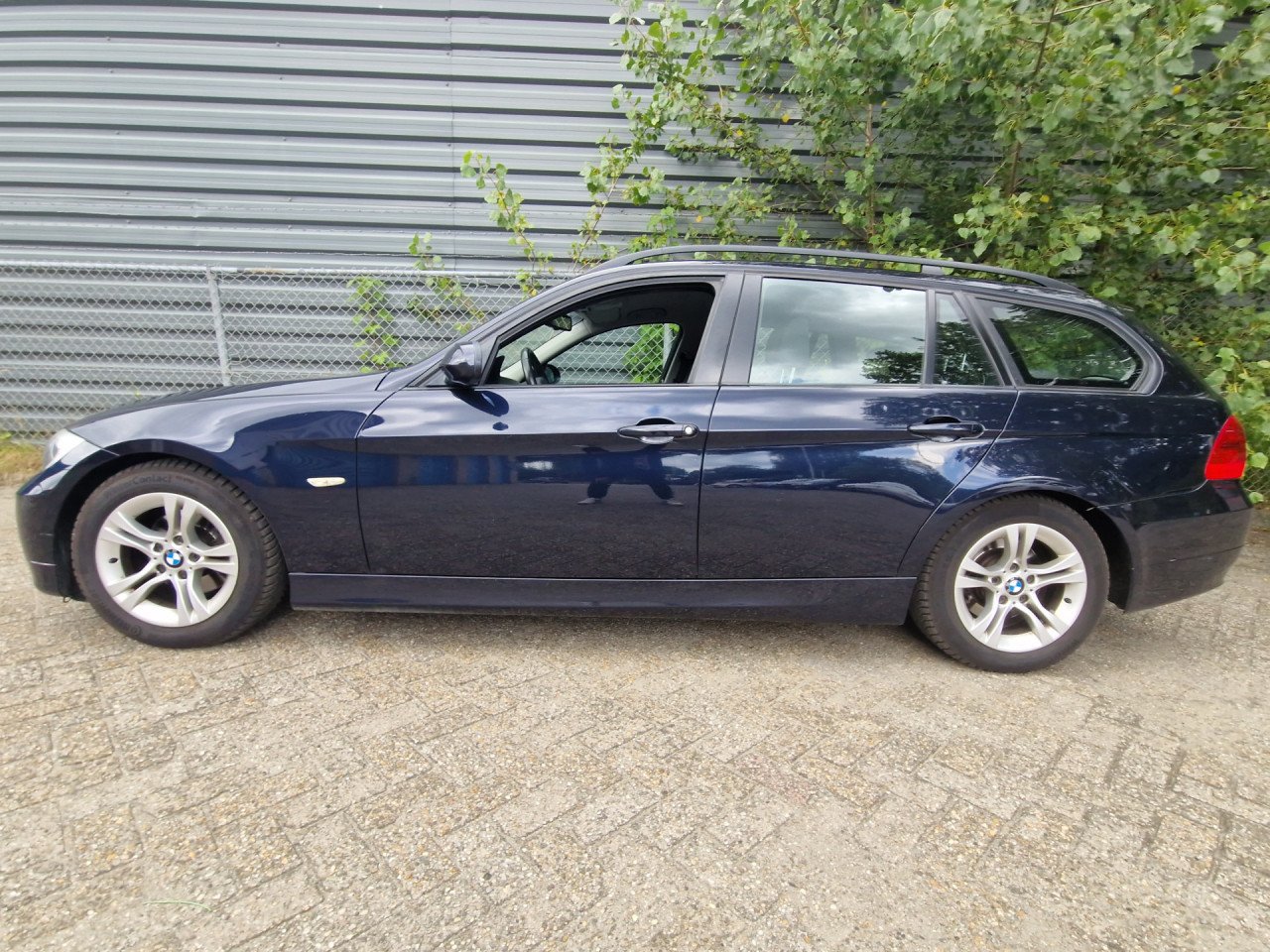 BMW 3-serie Touring 318i High Executive