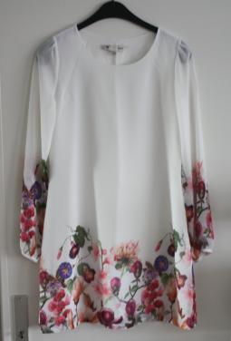 Witte jurk met bloemen print maat 38