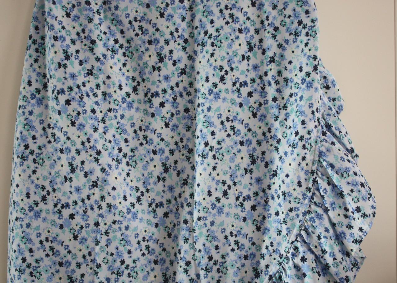 Licht blauwe wikkelrok  met bloemen print maat 46