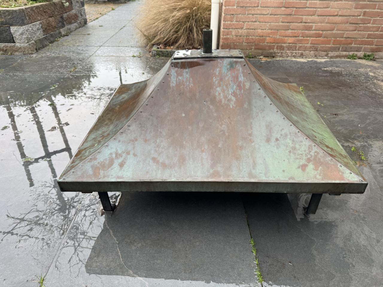 Koperen schoorsteenkap