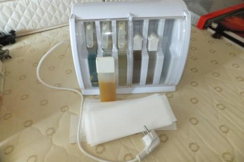 Elektrisch hars of olie apparaat