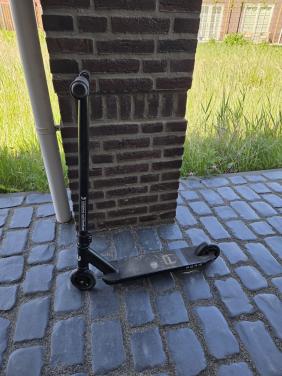 Stuntstep zwart in goede staat